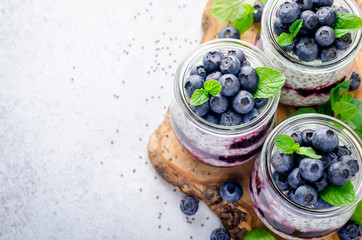 Wall Mural - Chia pudding with blueberry, mint leaves  and jam