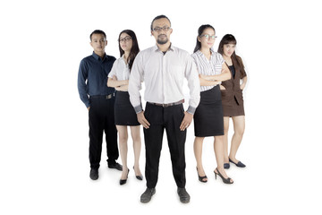 Canvas Print - African manager standing with his team on studio