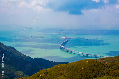 Cuadros en Lienzo Aerial view of the Lantau Island in Hong Kong with nature, new bridge and the oc