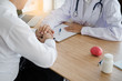 © xreflex - Doctor's hand holding hands patient encouragement. healthcare and medical concept.