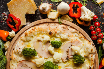 Wall Mural - Cauliflower and broccoli pizza. Diet dish with lots of vegetable proteins for healthy nutrition concept