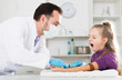 © JackF - Male doctor injecting little patient
