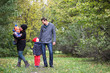 © alexkich - Young family with children on a walk