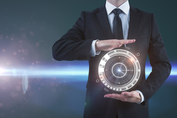 Aufkleber - Businessman holding digital clock
