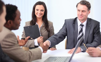 Wall Mural - handshake business partners at a business meeting