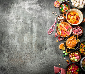 Poster - Multicolored candy, jelly and marshmallows in a bowl.