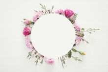 Top View Of Beautiful Flowers Arrangement On White Wooden Background. Copy Space.