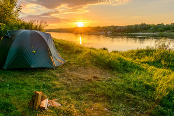 camping tent in a camping on the river bank