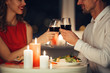 © Drobot Dean - Cropped photo of lovers having romantic dinner at home