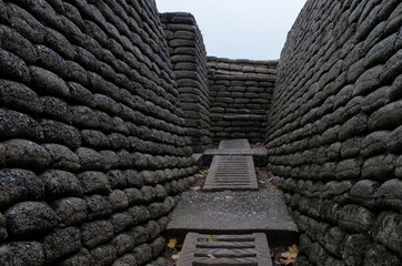 Reconstructed trenches made using concrete moulded sand bags 