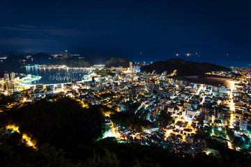 Fototapete - Night View of Sugarloaf Mountain and Botafogo in Rio de Janeiro, Brazil