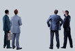 © ASDF - four business mans from the back - looking at something over a white background.