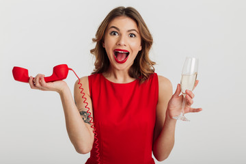 Sticker - Portrait of a happy young woman dressed in red dress