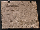 ancient stone relief at Chnum temple in Egypt