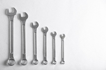 Poster - Plumber's tools on light background