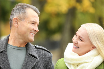 Happy mature couple in love outdoors