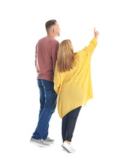 Mature couple in casual clothes walking on white background