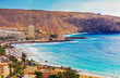 Aerial view over Los Cristianos beach and Adeje coastline in summer holiday, in Tenerife, Spain