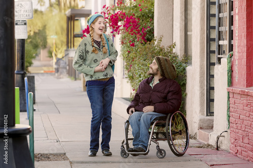 Fotografie, Obraz Young Woman and Man in Wheelchair Talking