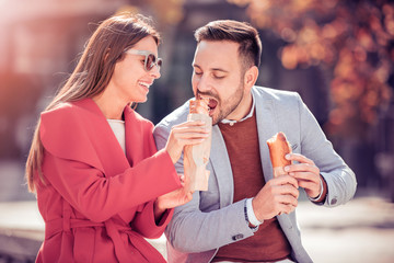 Wall Mural - Couple having lunch outdoors