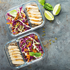 Healthy meal prep containers with quinoa and chicken