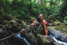 Couple Kissing In The Rainforest