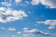 blue sky with stratocumulus and cumulus clouds on a day