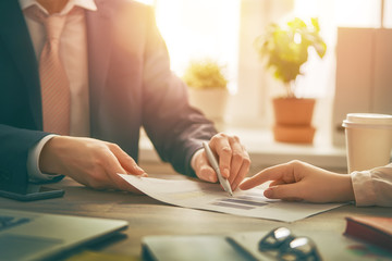 Man and woman working in office