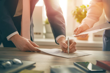 Wall Mural - man and woman working in office