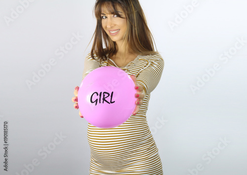 Belle Femme Enceinte Annoncant Le Sexe Du Bebe Par Un Ballon Rose Stock Photo Adobe Stock