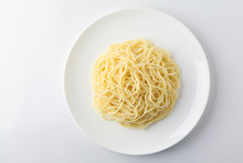 A Plate Of Spaghetti Pasta Isolated On White Background.