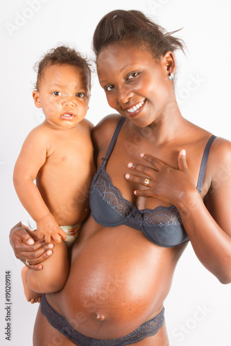 Baby Black Girl Nude - black pregnant woman with first naked baby on her belly ...
