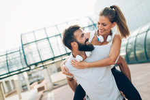 Portrait Of Young Attractive Happy Fitness Couple