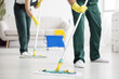 © Photographee.eu - Cleaning team wiping the floor