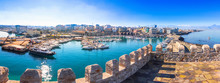 Heraklion Harbour With Old Venetian Fort Koule And Shipyards, Crete, Greece