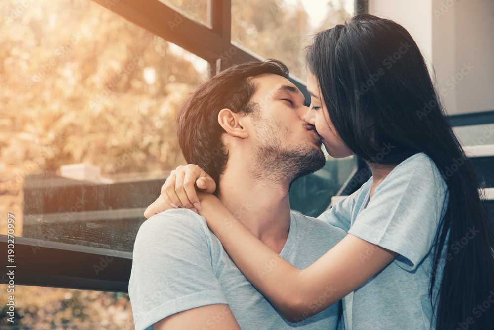 Sweet Young Couple Kissing in Romantic Moments Stock Photo | Adobe ...