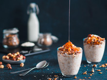 Gingerbread Coconut Overnight Oatmeal Served With Granola,pecan,honey.Recipe And Idea Healthy Vegan Breakfast - Plant-based Milk Overnight Oats With Chia And Gingerbread Spices Cinnamon, Nutmeg,ginger