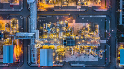 Wall Mural - Aerial view Petrochemical plant at night, Oil refinery plant at night.