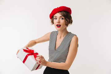 Wall Mural - Portrait of a surprised woman wearing red beret