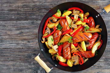 Poster - grilled sausages with potato wedges, mushrooms