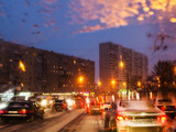 Fototapeta  - car traffic in Moscow city in snowy evening