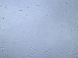 Fototapeta Tęcza - raindrops on a windowpane