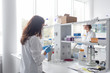 © ADDICTIVE STOCK - Women standing and working in lab