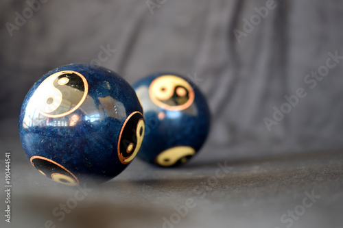 Fotografie, Obraz Two Yin Yang balls on a black background