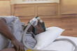 © JPC-PROD - Healthcare concept,African, American Man with obstructive sleep apnea sleeping well with cpap machine ,Man laying in bed wearing cpap mask, on white backgroud