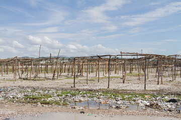 empty wood frames on hillside 