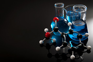 organic chemistry, science class and stem research concept with a methyl benzoate molecule on blue c