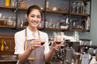 © Bavorndej - Asian Barista woman making Coffee with coffee machine in the coffee shop. people with barista in cafe concept.