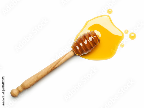 Photographie Honey dipper on white background