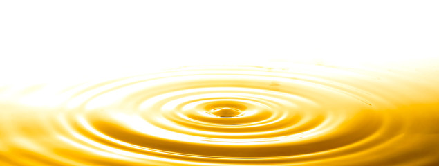 liquid gold drop and ripple ,abstract background